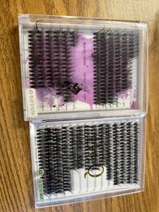 lot 902 image: two pack of lashes. Some are missing from each package, but the rest that are here are new.