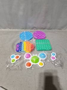 lot 170519 image: 7 PIECE FIGOAL POP BUBBLE ITEMS