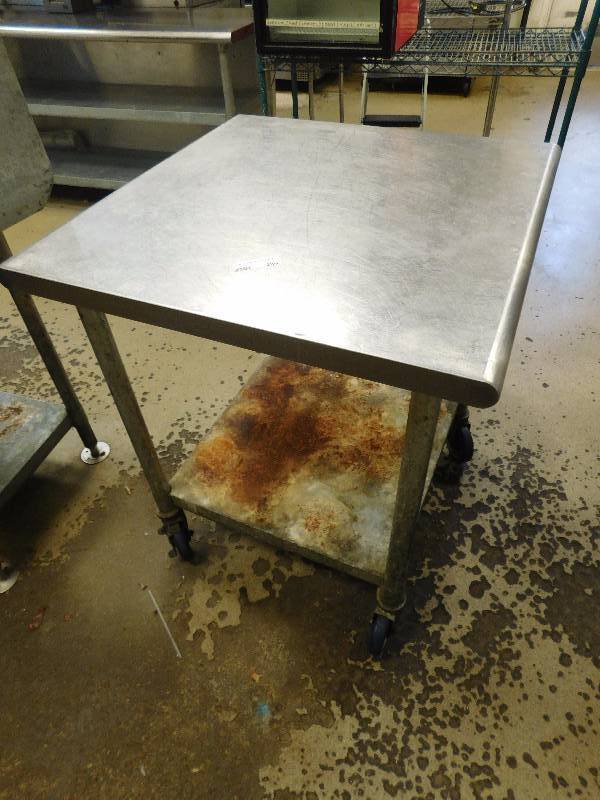 lot 286 image: 30 Inch Square Stainless Steel Table on Casters