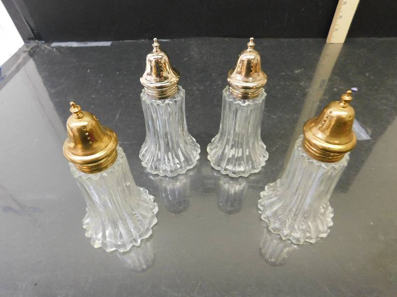 lot 8020 image: 2 Sets Matching Brass and Polished Brass Capped Hong Kong Glass Salt and Pepper Shakers.