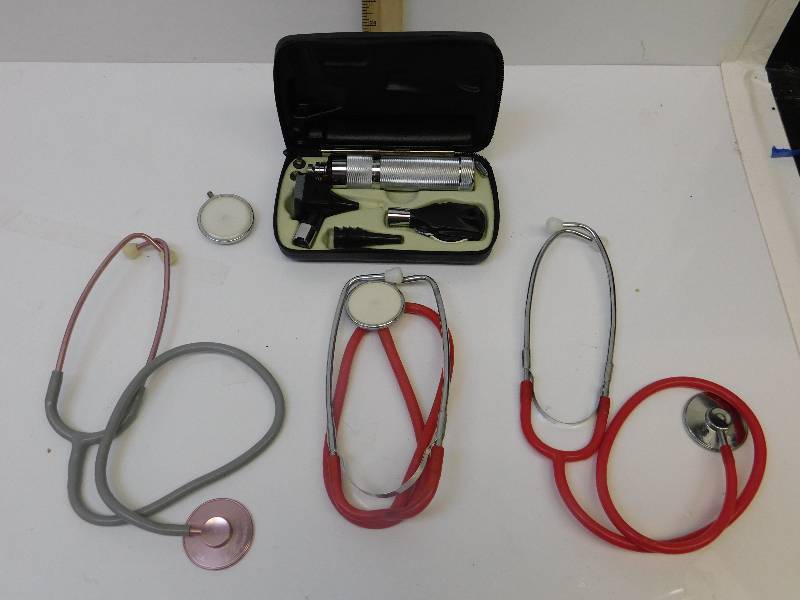 lot 8024 image: Vintage Welch Allyn Otoscope & Opthalmoscope in Hard Case.  3 Stethescopes.