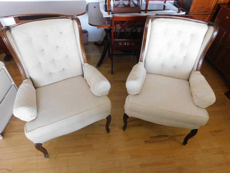 lot 8049 image: Two Matching Petite, 40 Tall Cloth and Wood Leg Wingback Chairs.