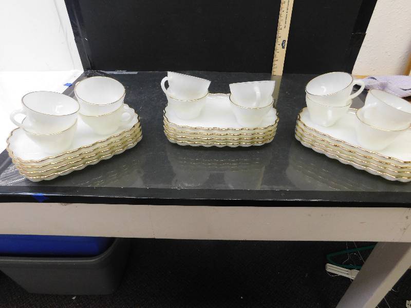lot 8125 image: 12 Anchor Hocking Oven Proof Dinnerware Cups and X-Large Saucers.