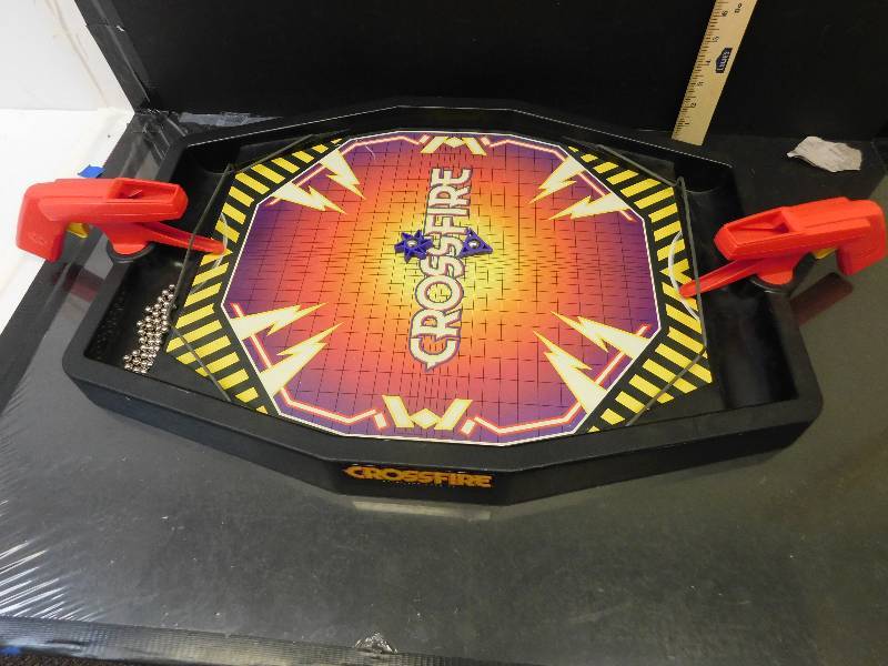 lot 8135 image: Vintage Crossfire Tabletop Game. Complete with 55 Ball Ammo and 2 Pucks.