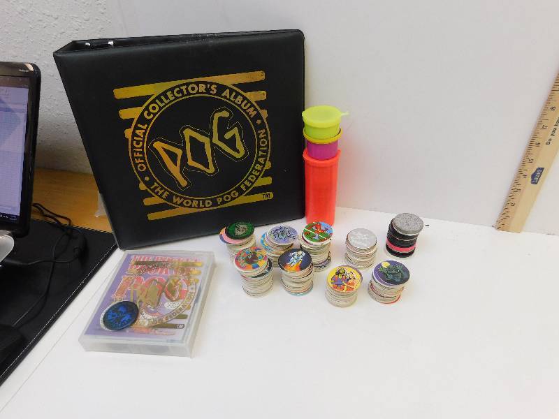 lot 8137 image: Large Collection of POGS and Slammers. Playmat. Binder w Pog Specific Sleeves. Tubes and More.