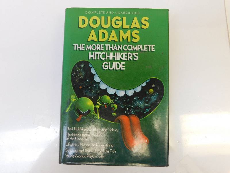 lot 8198 image: Complete and Unabridged  The More than Complete Hitchhikers Guide. Hardback Book.