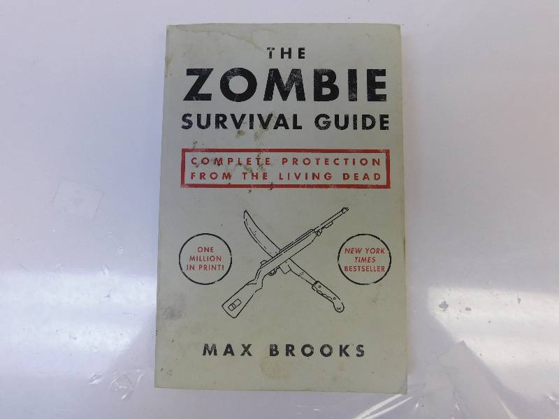 lot 8209 image: The Zombies Survival Guide  Complete Protection from the Living Dead.