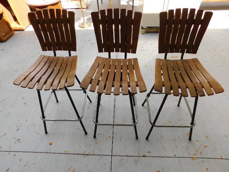 lot 8265 image: Three Matching Low Barstool Swivel Chairs.
