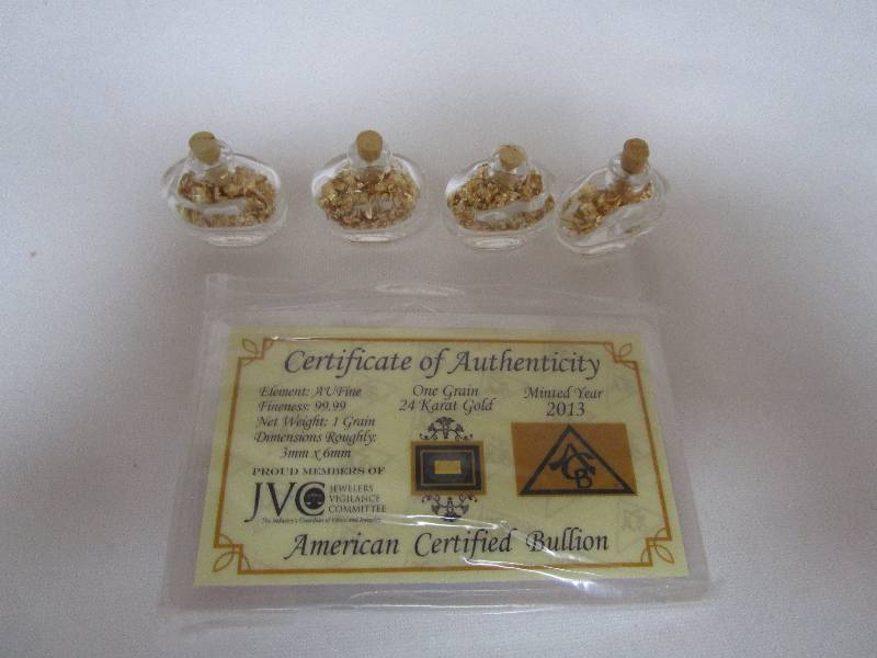 lot 651 image: Gold Flake Lot and Graded Silver