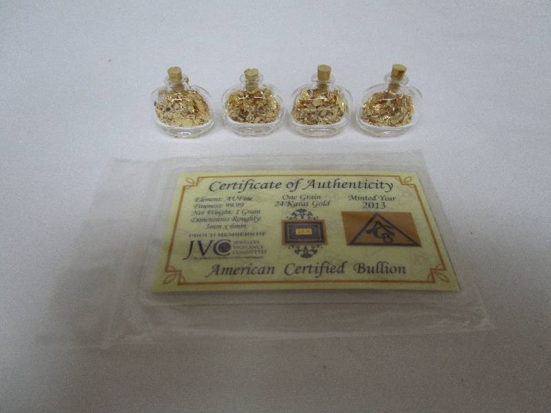 lot 653 image: Gold Flake Lot and Graded Silver