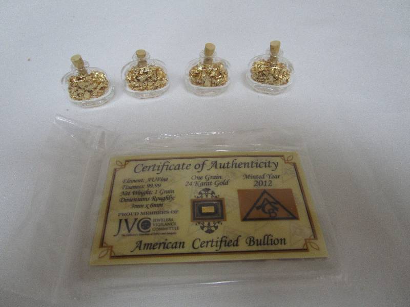 lot 654 image: Gold Flake Lot and Graded Silver