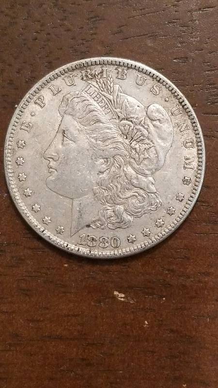 lot 710 image: 1880 Morgan Silver Dollar