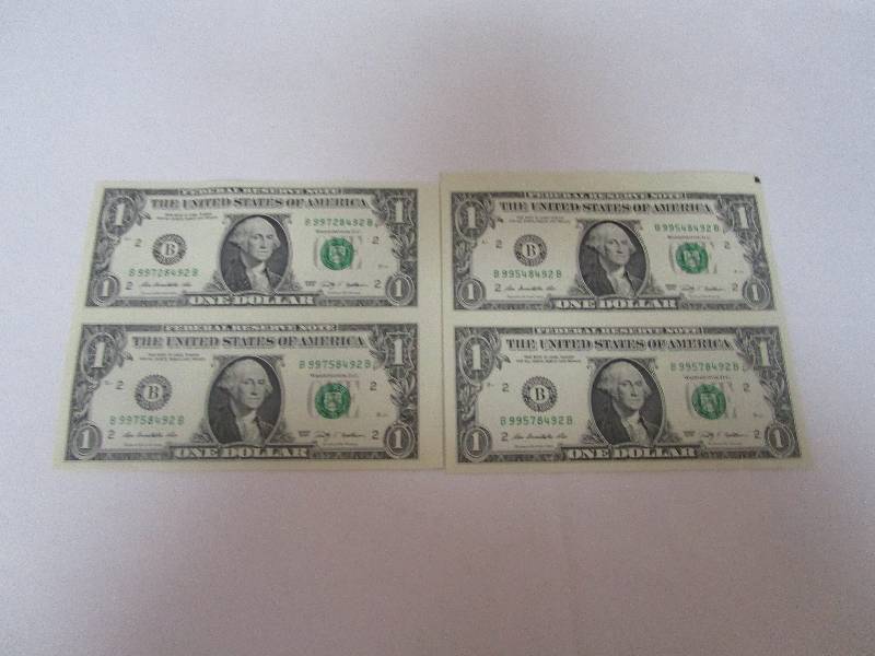 lot 840 image: Lot of Uncut One Dollar Bills