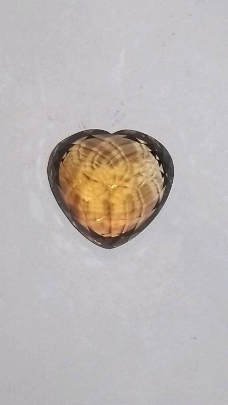 lot 615 image: Heart Shaped Faceted Gemstone
