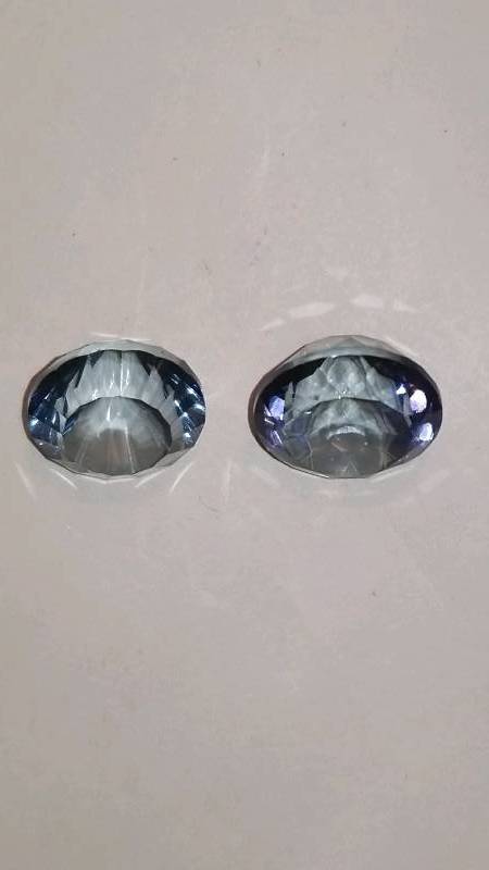 lot 731 image: Pair of All Natural Faceted Precious Gemstones
