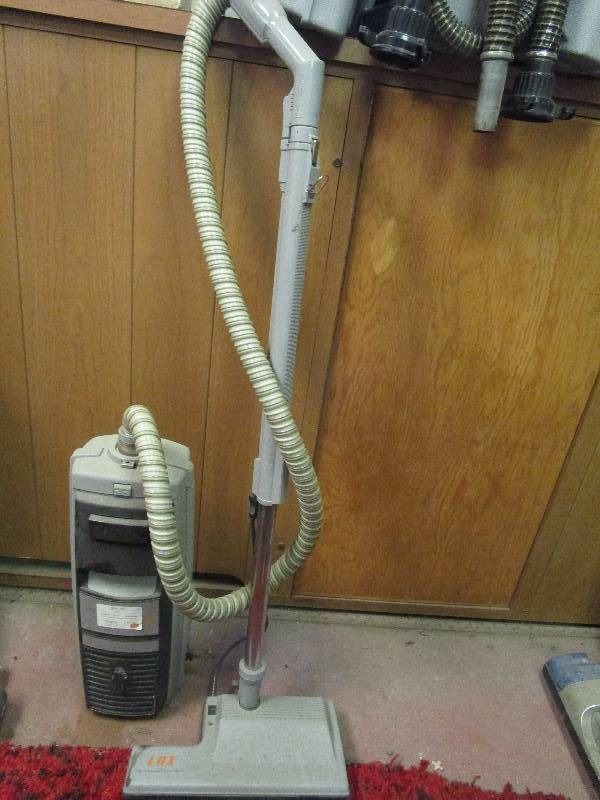 lot 312 image: Cannister Vacuum