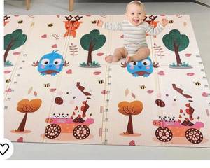 lot 33032 image: Foldable Baby Play Mat Owl - Extra Large - Premium Quality Foam Mat with Waterproof, Intensity Thickness Bands for Infants and Toddlers - Perfect for Playtime (Owl, Reverse side is Fish, Birds, Boats and Lighthouses) 75 x 58 x 0.4) (Retail Approx. $52.99)