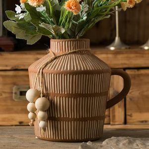 lot 4015 image: Mowtanco Rustic Farmhouse Vase with Handle and Boho Wooden Beads, Vertical Stripes Terracotta Vase Clay Vase - Ceramic Flower Vase for Vintage Home D�cor, Shelf, Table, Bookshelf, Mantle, Entryway