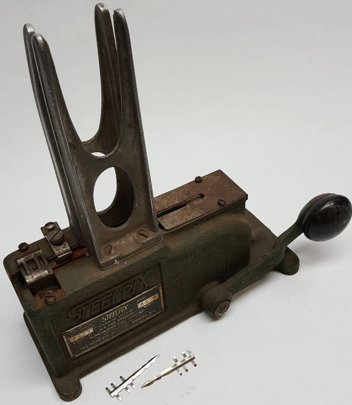lot 6433 image: Flower shop Steel Pix stem binding machine.  Sorry no other info on this expensive looking device WYSIWYG