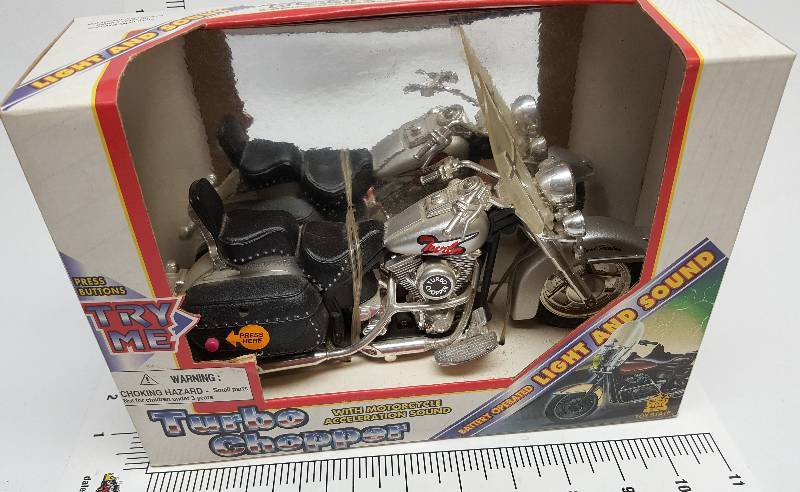 lot 6434 image: Still in the display package is this ROAD RIPPERS TURBO CHOPPER ELECTRONIC CYCLE with SOUNDS #3416