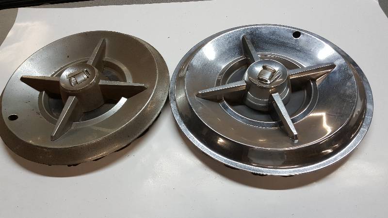 lot 6393 image: Pair Lancer looking wheel covers.  One 14 and one 15