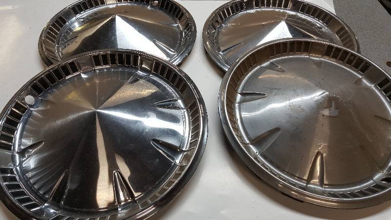 lot 6397 image: Set of 4 dimple Plymouth style wheel covers