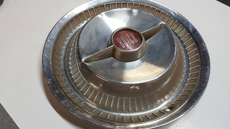 lot 6401 image: Single Buick 2 bar flipper wheel cover
