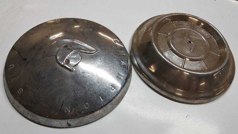 lot 6408 image: Pair of mismatched Studebaker hub caps