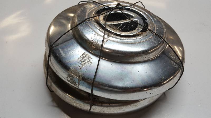 lot 6409 image: Again no idea what foreign car these 4 small hub caps were off of