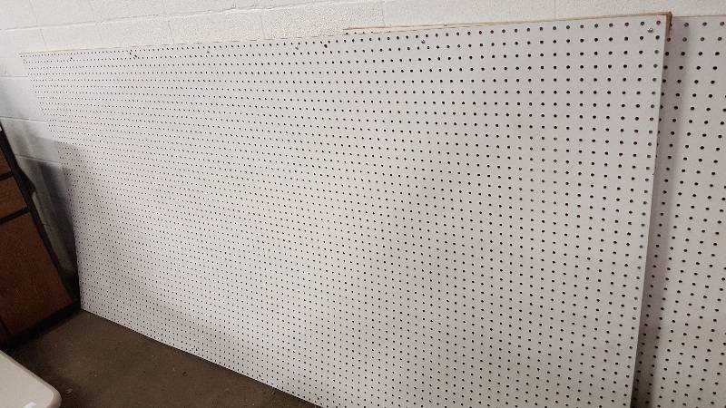 lot 6363 image: 4 X 8 painted White 14 holes peg board.  Its been used but no other holes than it came with