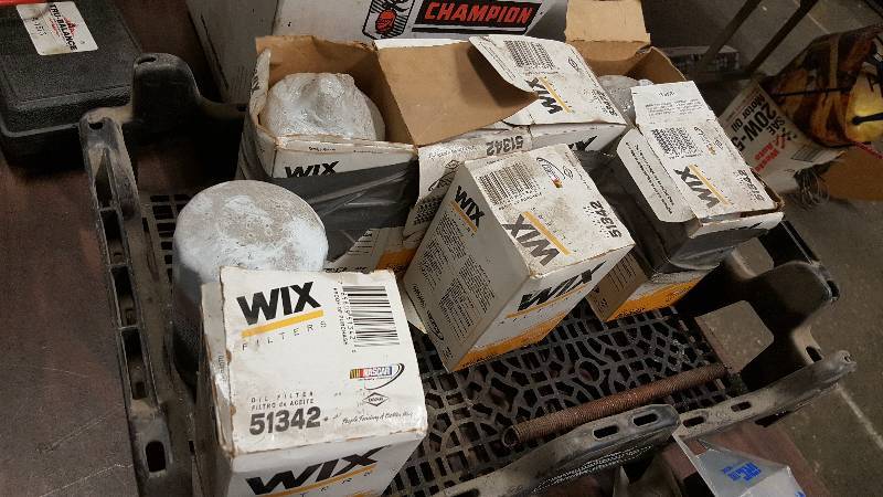 lot 6335 image: Crate full of 8 or 9 new Wix 51342 oil filters Principal Application Porsche (77-82)(92), Volkswagen (74-96)