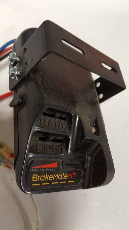 lot 6339 image: In excellent condition is this BrakeMate MT electric trailer brake controller for mounting under the dash of your truck or RV