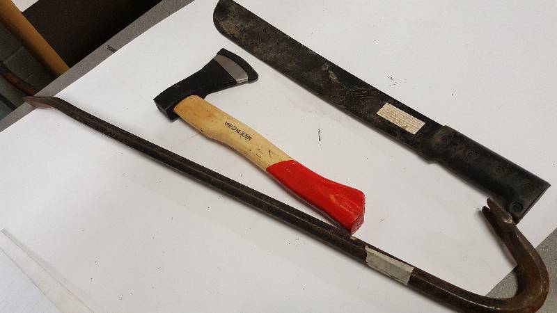 lot 6347 image: Cool Tools lot here crow bar, machete and small axe