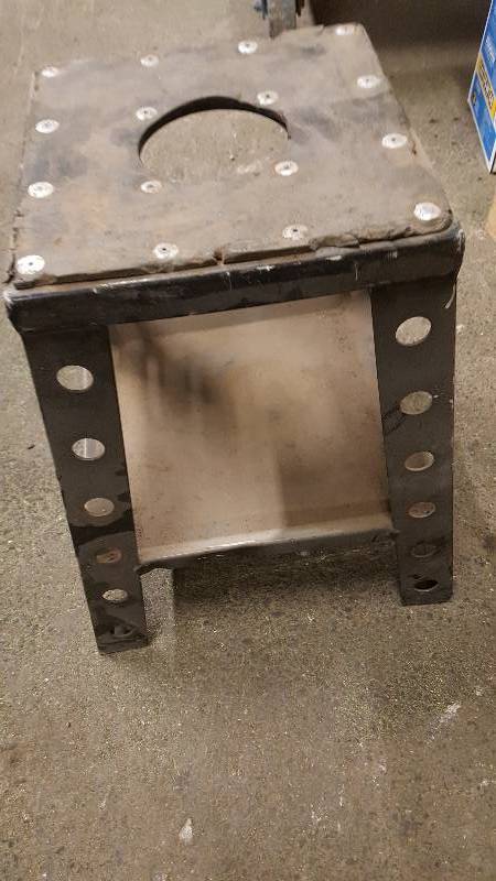 lot 6666 image: Cool light weight aluminum motorcycle or ATV in the shop or at the races work stand.