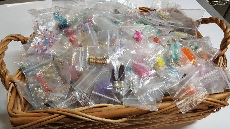 lot 6301 image: Got to be hundreds and hundreds of cosmetic ear rings bagged in pairs for selling at shows and flea markets.