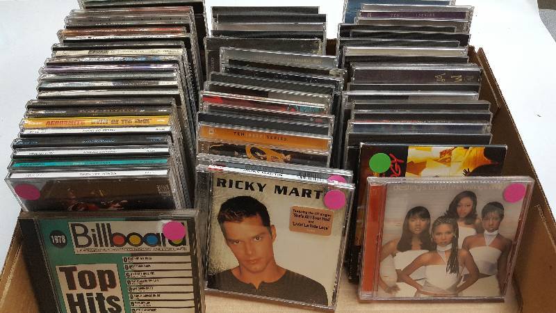 lot 6302 image: Over 50 of these CDs going to the high bidder.  Lots of popular artists included and maybe a few that are still sealed