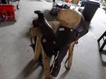 Beautiful leather saddle w/stirrups/saddle stand - very good shape.
