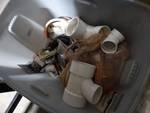 Large lot of various plumbing supplies-PVC pipe and misc.