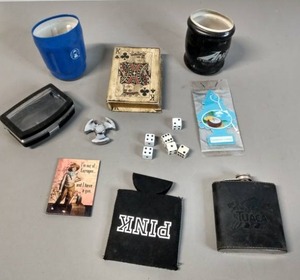 lot 38 image: Fun Items In This Treasure Lot - Tuaca Flask, Coozies, Dice, Fidget Spinner, King of Clubs Box