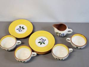 lot 63 image: Stangl Pottery Trenton, NJ Blueberry 4 Teacups, 5 Saucers & Creamer