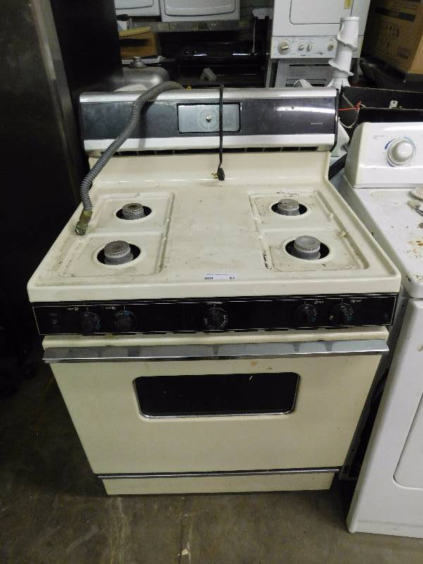 lot 24 image: Kenmore Oven With 4 Burner Stove Top
