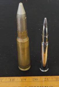lot 120 image: (2) Bullets.