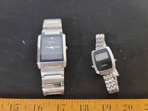 lot 125 image: Fossil and Timex Watches.