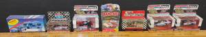 lot 192 image: Amoco Nascar, Super Stars, Pfizer, and Band-Aid Collectible Nascar Cars.