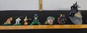 lot 216 image: Wizard Of Oz Ornaments and Wicked Witch Snow Globe(Broken)