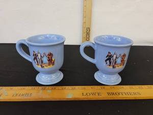 lot 218 image: Pair of Wizard Of Oz Mugs Wishes Really Do Come True