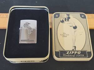 lot 299 image: 1935 Vintage Varga Girl Zippo Lighter wcase