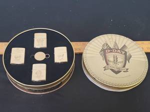 lot 301 image: Limited Edition 50th anniversary Vintage D-Day Normandy Zippo lighter set in tin