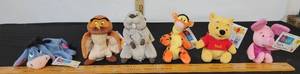 lot 310 image: Winnie The Pooh Stuffed Plushes