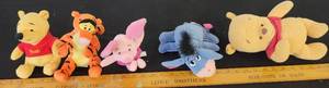 lot 311 image: Winnie The Pooh Stuffed Plushes